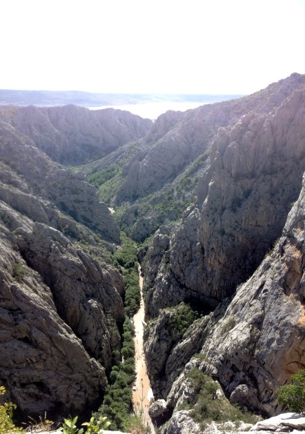 View from the top of Debeli Kuk; Adriatic Sea in the background, Klanci canyon with its cobblestone path in the foreground 