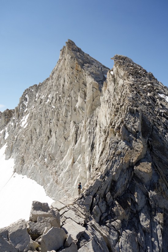 In the end of June I made my first trip of the summer out to Tuolumne meadows. There I climbed Tenaya peak and the North Ridge of Mt. Conness. Here I am along the north ridge, admiring the view. In reality, it was extremely windy and stopping for a photo proved to be difficult because I wanted to keep warm! 