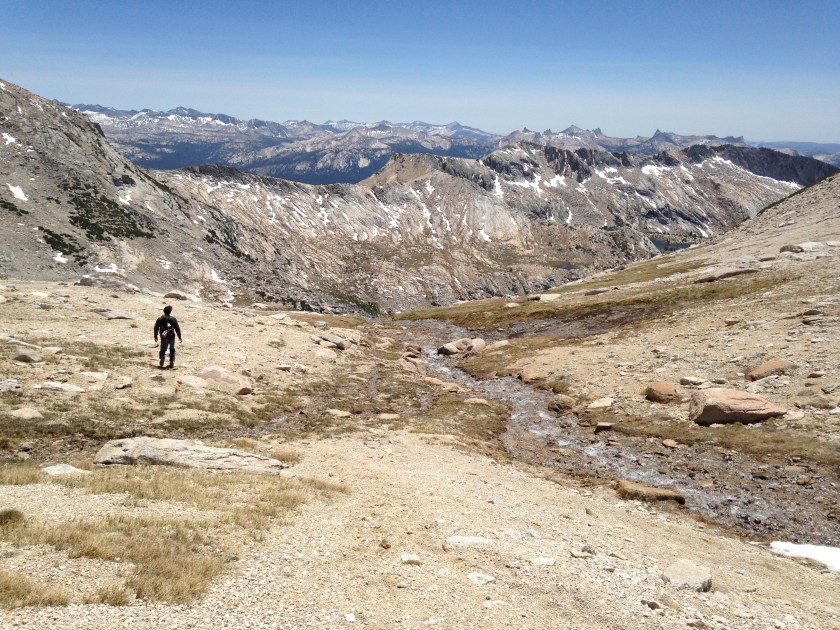 My partner descending from Conness... the wrong way. Turns out we got thrown for a loop and ended up going down completely the wrong way. What resulted was us dropping back down to 10,000 ft elevation (From the 12.6k foot summit), scrambling back up to to 12,000 ft (bagging White mountain in the process), spotting highway 120 in the distance, downclimbing the slabs of white mountain and bushwhacking 5 miles to finally hit the road around 7 PM. Luckily, we were able to hitch-hike to our car. Arrived back in SF at 1:30 AM, was at work at 8 AM the next day. Quite the adventure! 