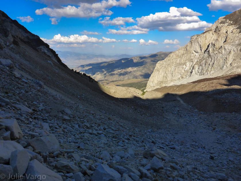 After hiking 3 miles with a 3,000 ft elevation gain and traversing the entire east ridge, the most tedious part of the route was yet to climb- the descent! After some 4th class downclimbing, 2 rappels and some scree-skiing we had the pleasure of boulder hopping here.. forever..